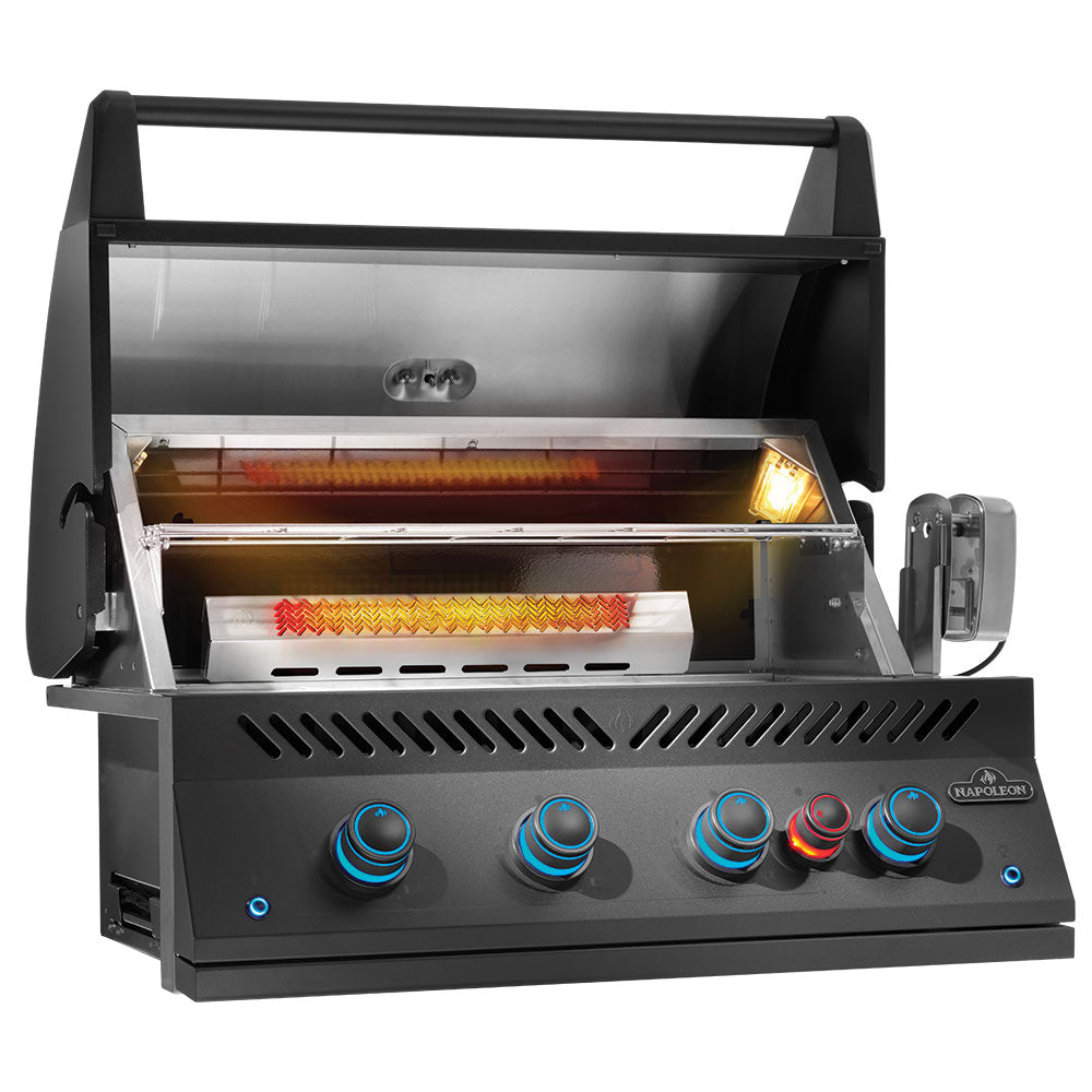 Matte black gas grill head open with glowing burner elements and four control knobs