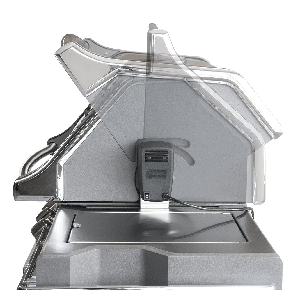 Rotisserie-style built-in grill with open lid and stainless cooking chamber and tray.