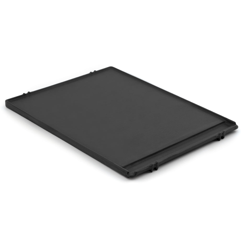 Cast iron griddle plate with smooth flat cooking surface and corner handles