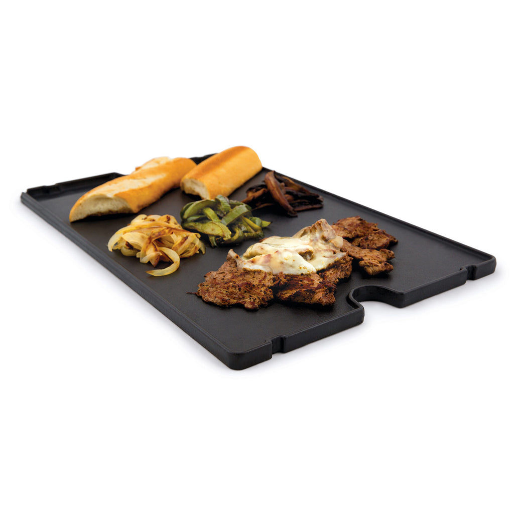 Broil King cast iron griddle with side handles, open flat cooking surface