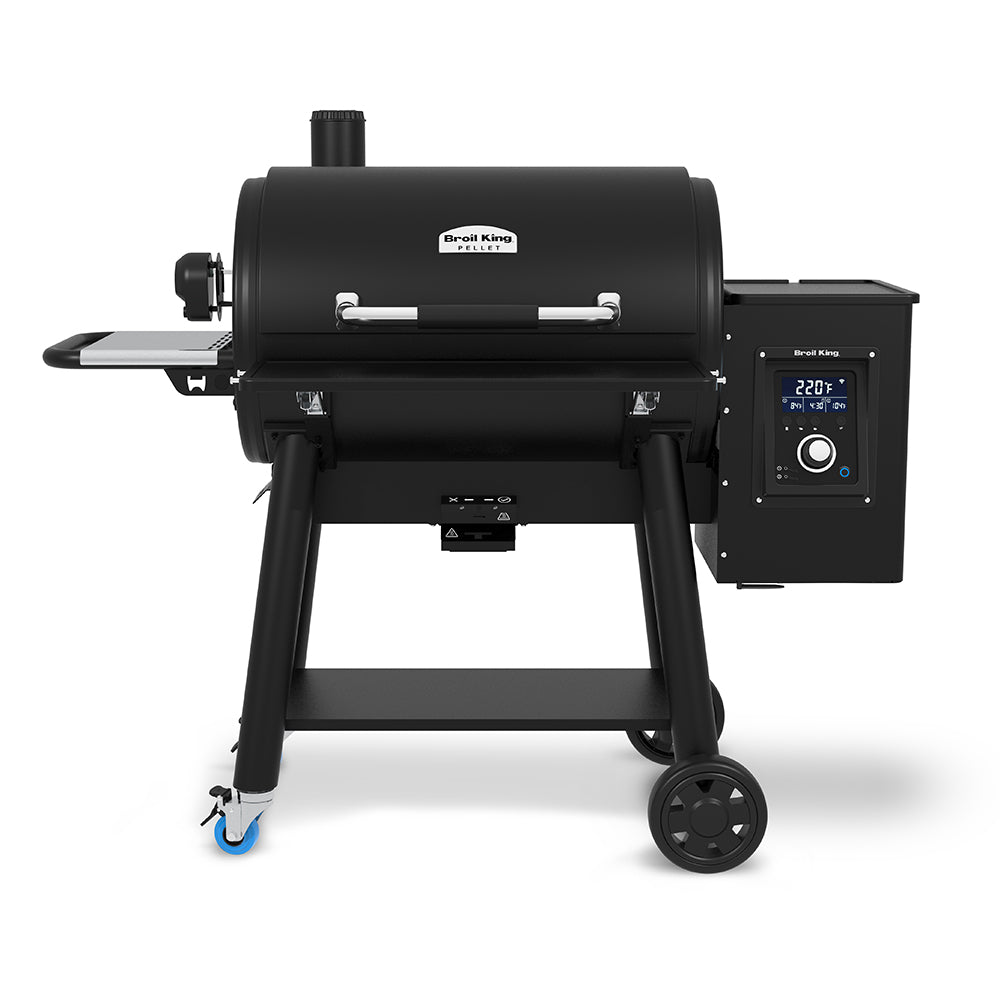Broil King pellet smoker grill with front control panel, side table, and wheels