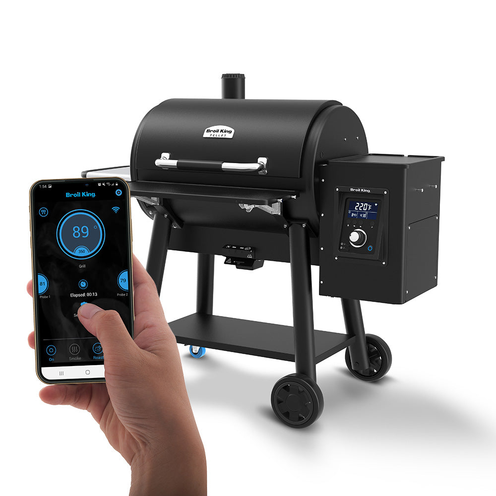 Broil King pellet smoker grill with phone controlling app on the controller
