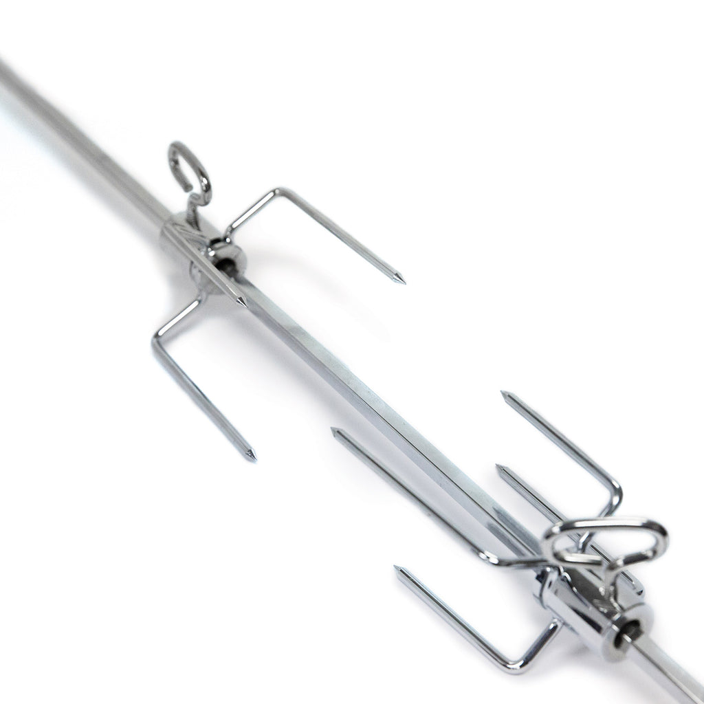 Broil King stainless rotisserie fork close-up with three sharp prongs