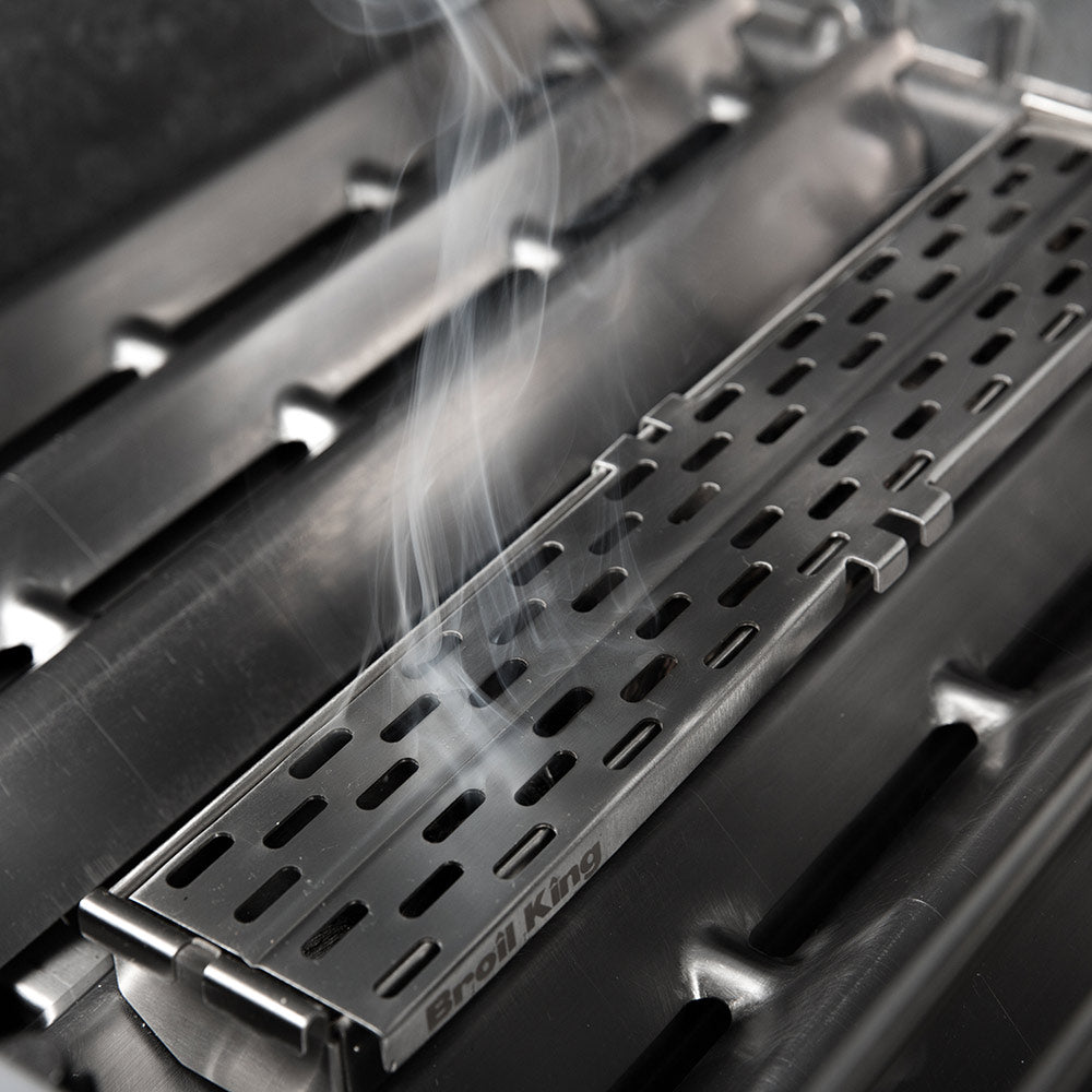 Stainless steel pellet smoker box by Broil King with perforated tray and side handles