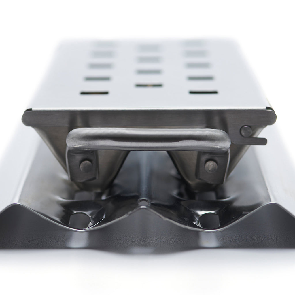 Broil King Imperial smoker box close-up of underside tray and mounting tabs, silver