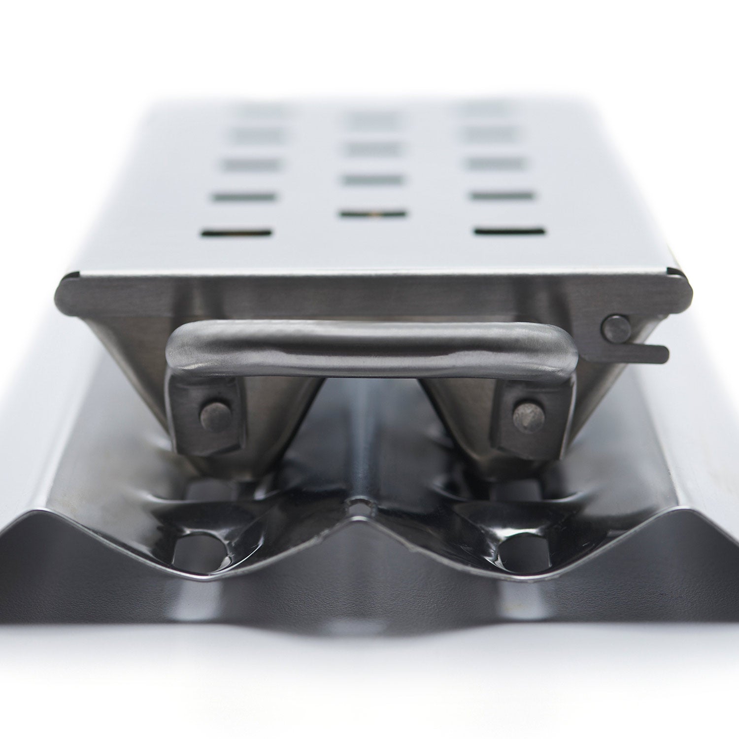 Broil King Imperial smoker box close-up of underside tray and mounting tabs, silver