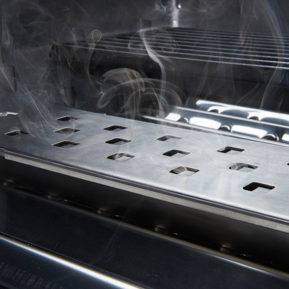 Broil King Imperial smoker box vented tray inside with smoke rising, steel