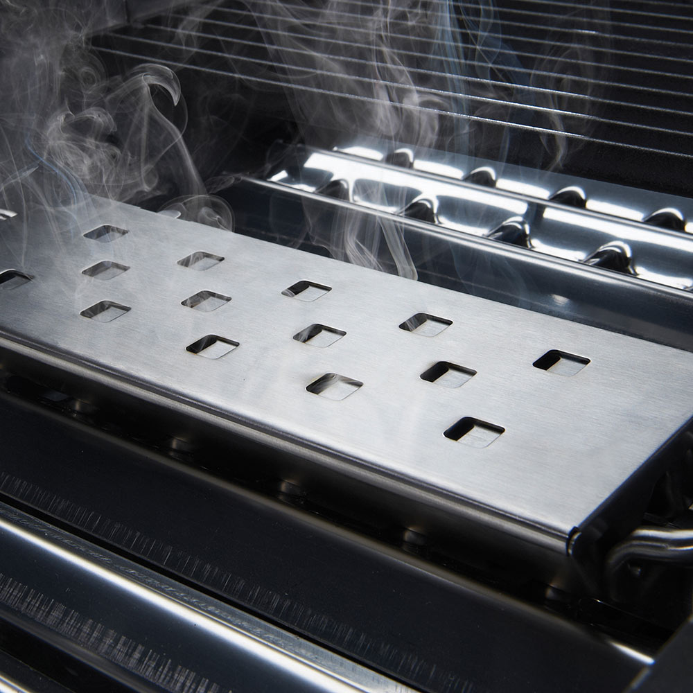 Broil King Imperial smoker box vented tray inside with visible smoke, steel