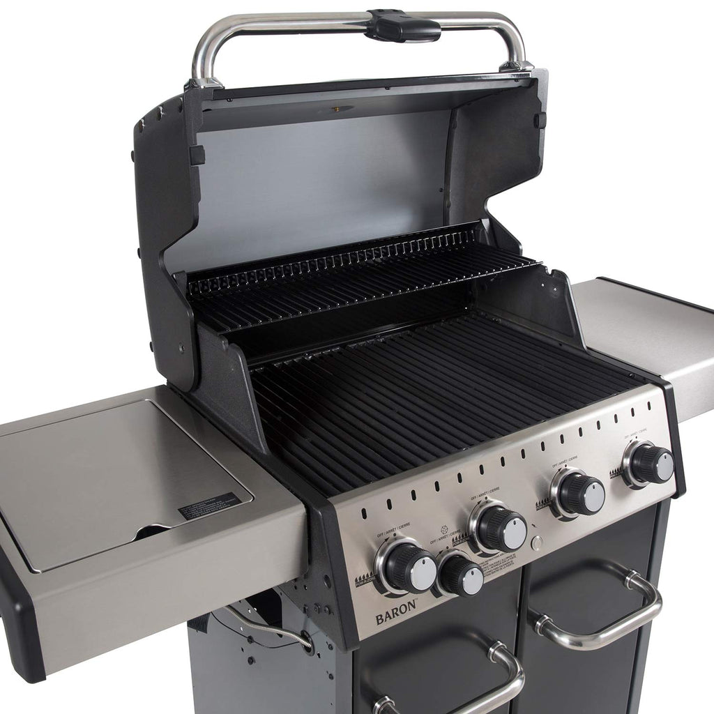 Grill interior with installed black grill light mounted above the cooking area