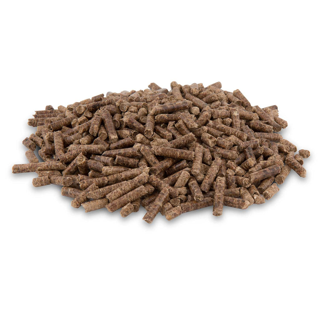 Wood pellets pile for grilling, dark brown small cylindrical pellets