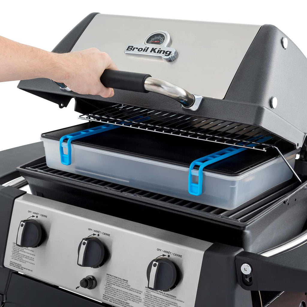 Porta-Chef grill tool set with tray held open above grill grates