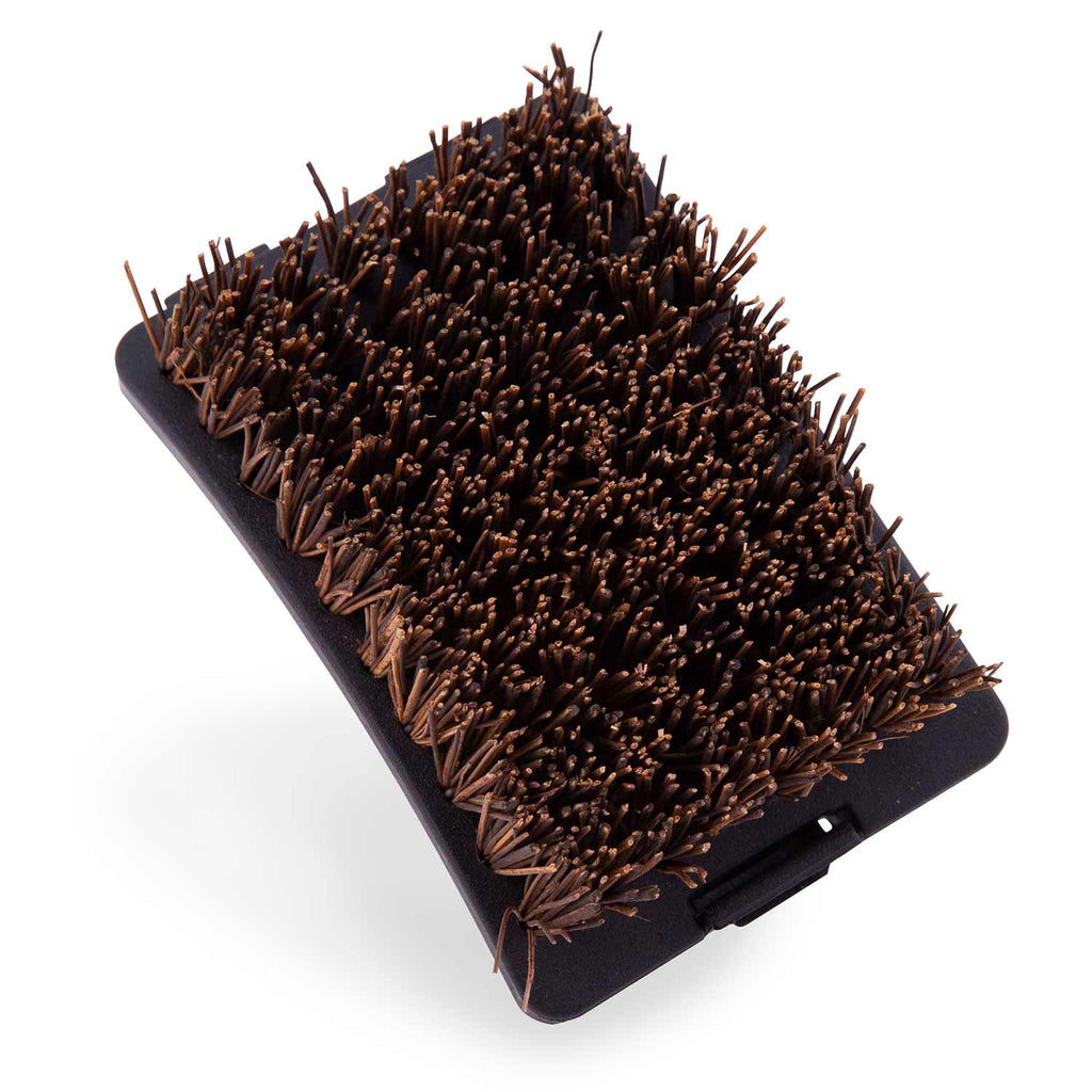 Grill brush head with dense brown bristles on black base