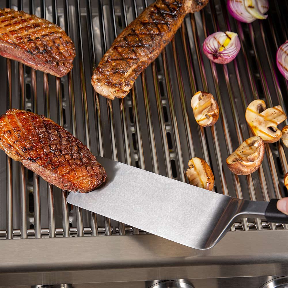 Baron Super Flipper grilling spatula with wide stainless-steel blade held forward