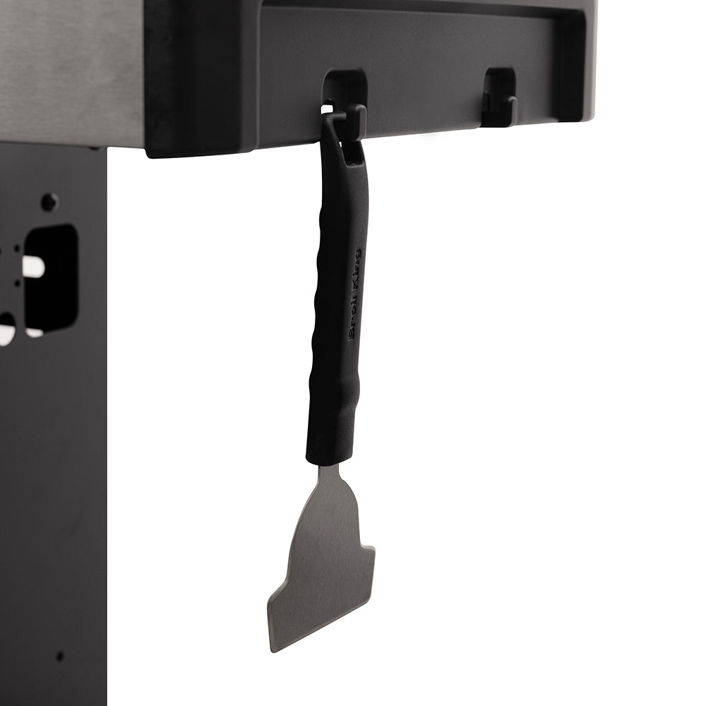 Griddle scraper tool with black handle and wide gray blade