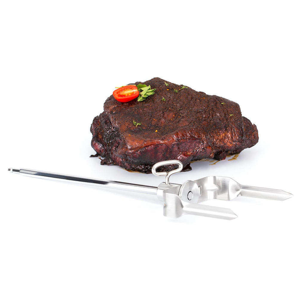 Meat shredder over seasoned brisket with toppings, silver prongs and lever.