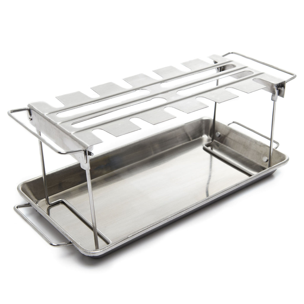 Stainless steel wing rack with raised cooking grid and two side support legs over a pan