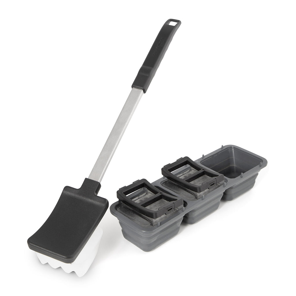 Ice grill brush with long handle and scraper head, plus gray ice tray blocks