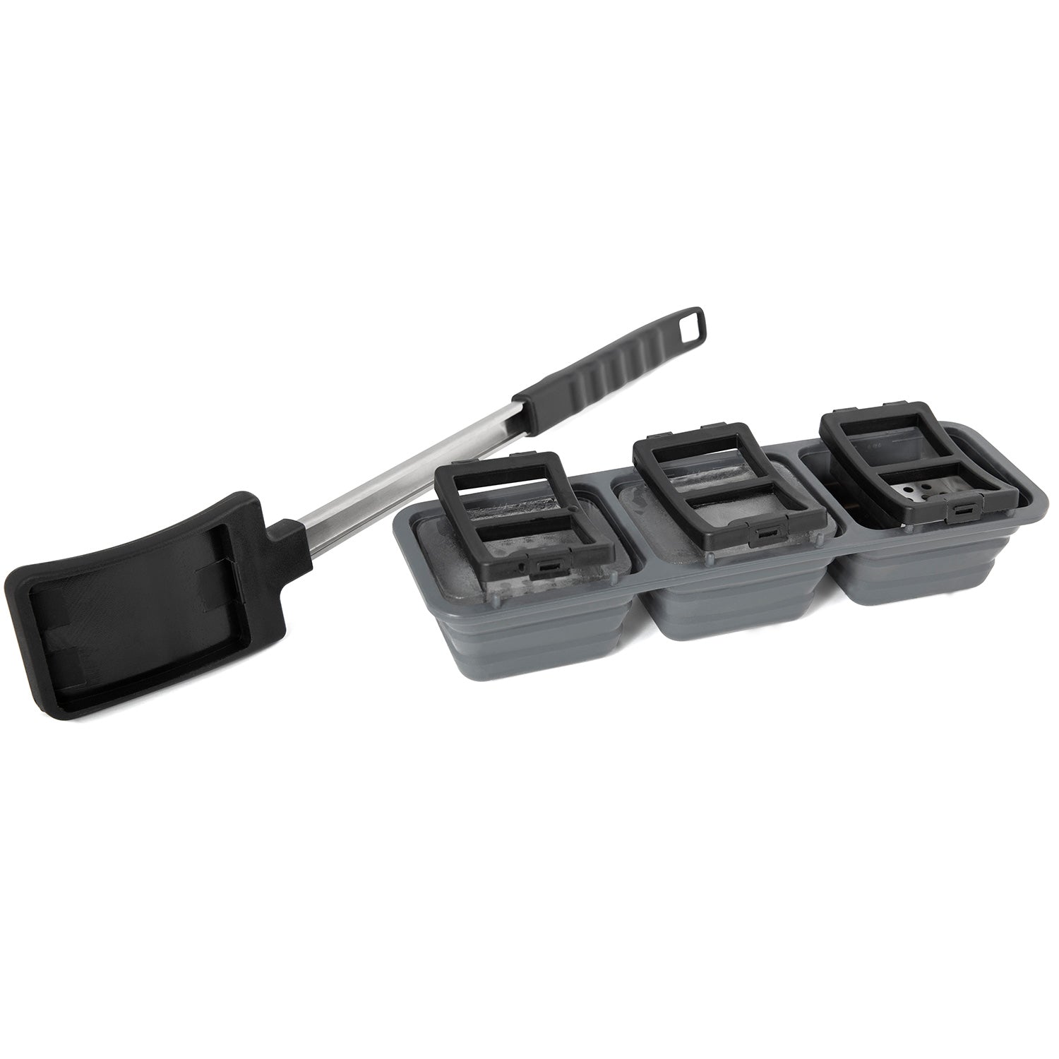 Ice grill brush with stacked gray ice tray blocks and black handle scraper