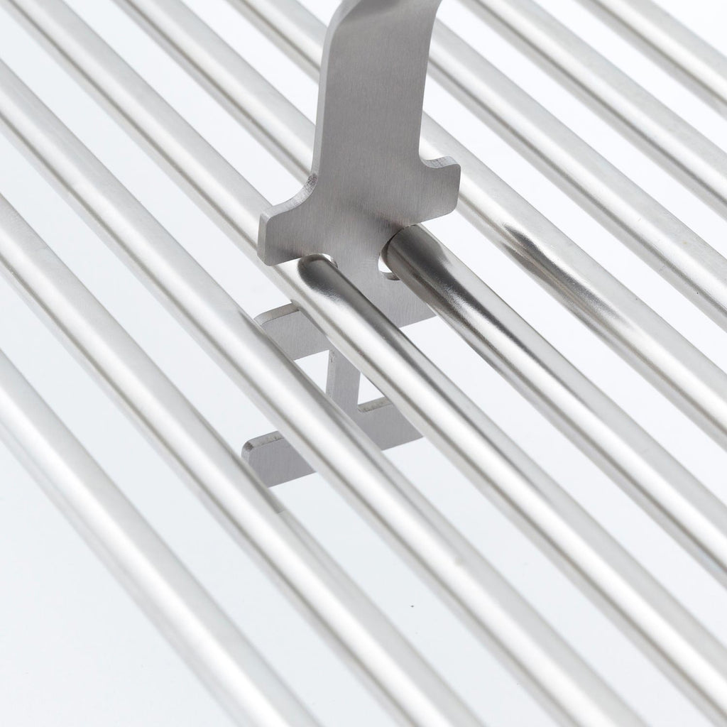 Broil King grid lifter head hooked on white grill grates