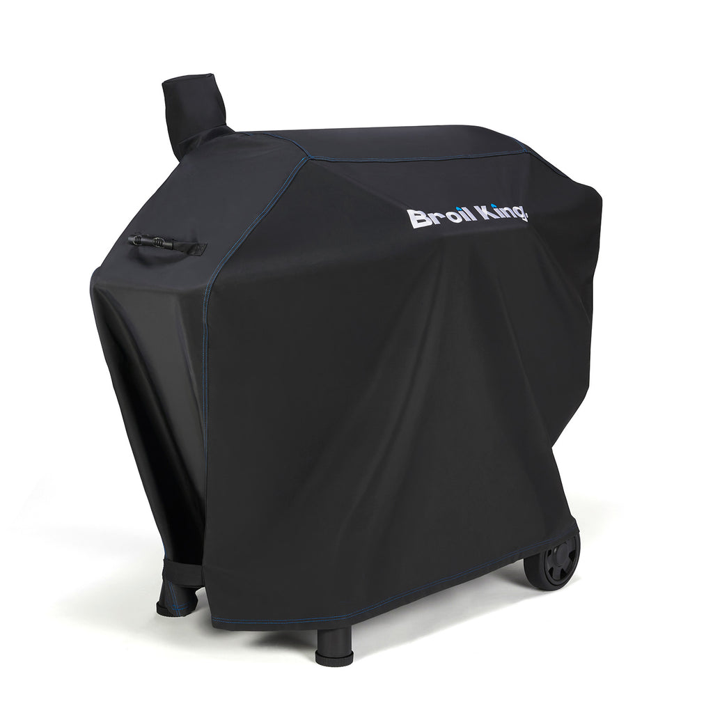 Broil King polyester grill cover, dark with logo, fitted over grill
