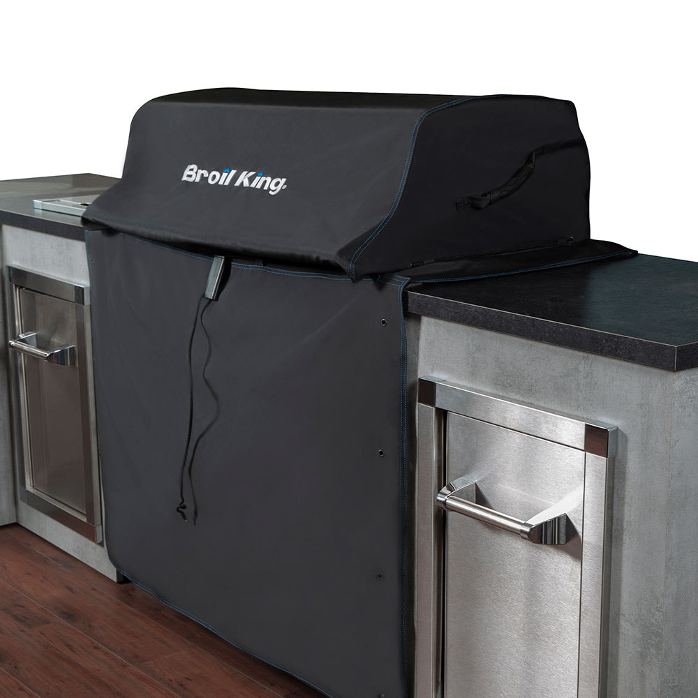 Black grill cover with Broil King logo, covering grill doors and side sections