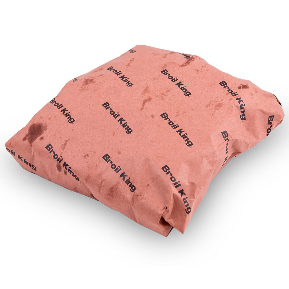 Crumpled pink butcher paper bundle with repeating Broil King logo print