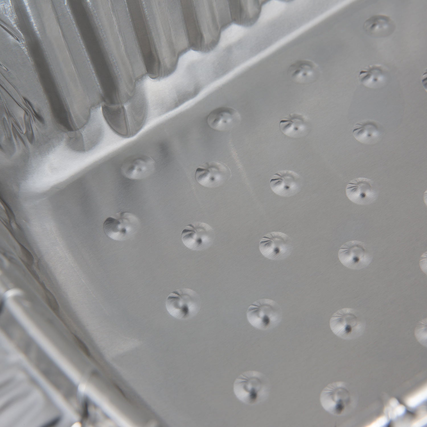 Aluminum foil roaster liner with raised dot pattern