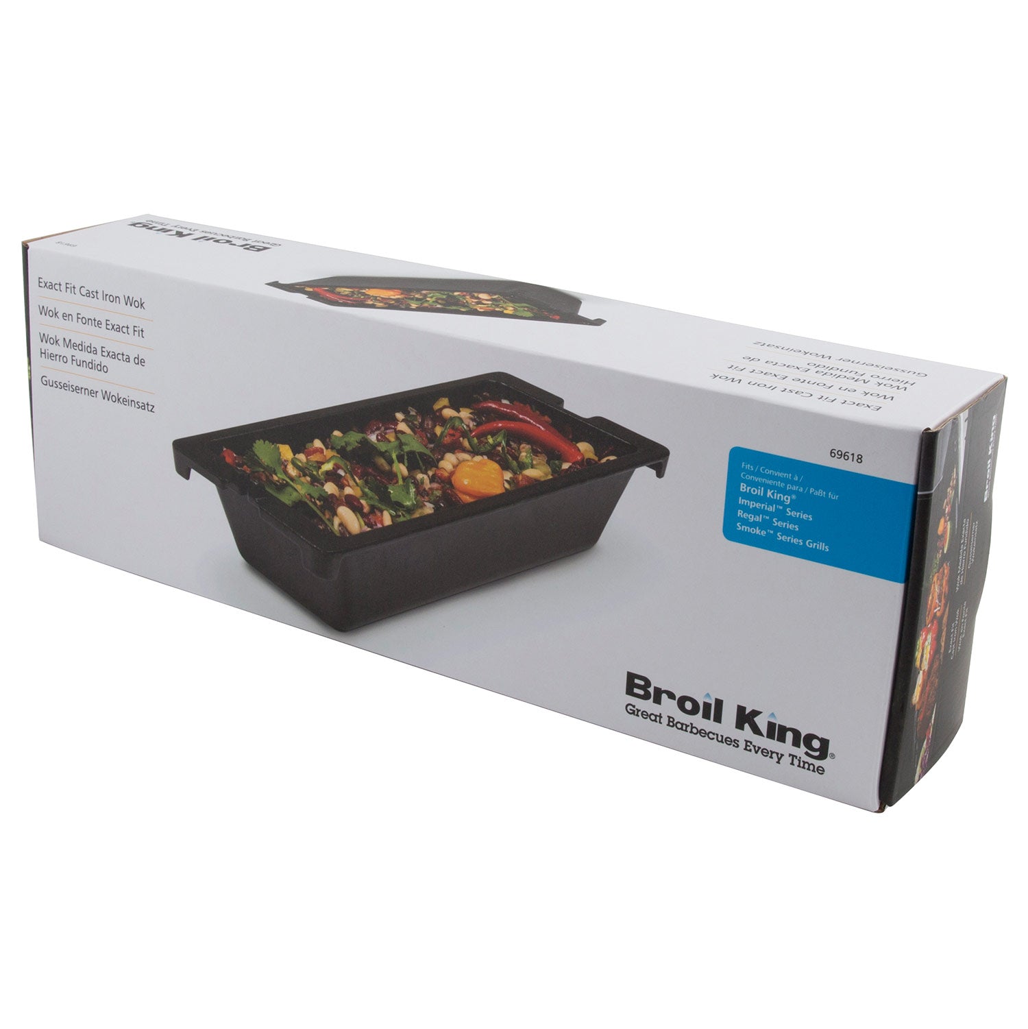 Boxed cast iron wok with product photo on lid, includes accessory info