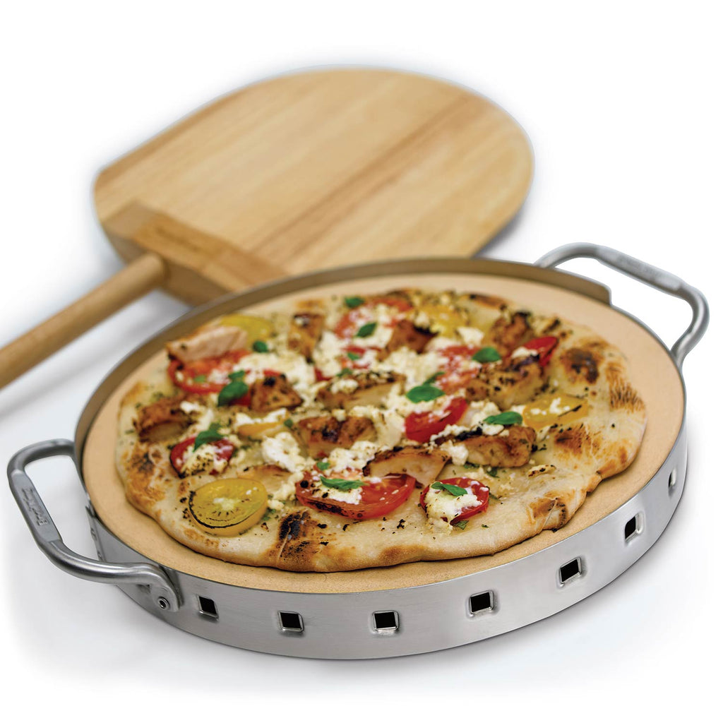 Stainless steel pizza stone grill set with topped pizza on stone