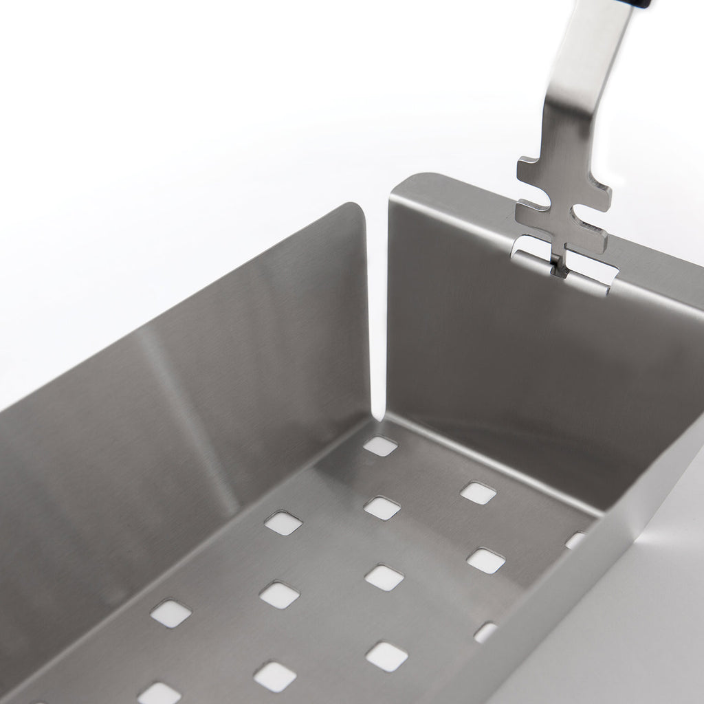 Stainless steel narrow wok topper interior with drain slots and mounting tabs