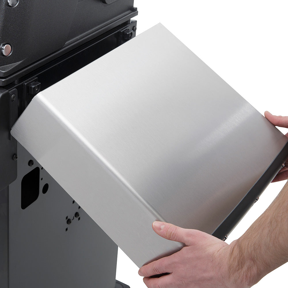 Stainless steel grill accessory tray being pulled out from side panel