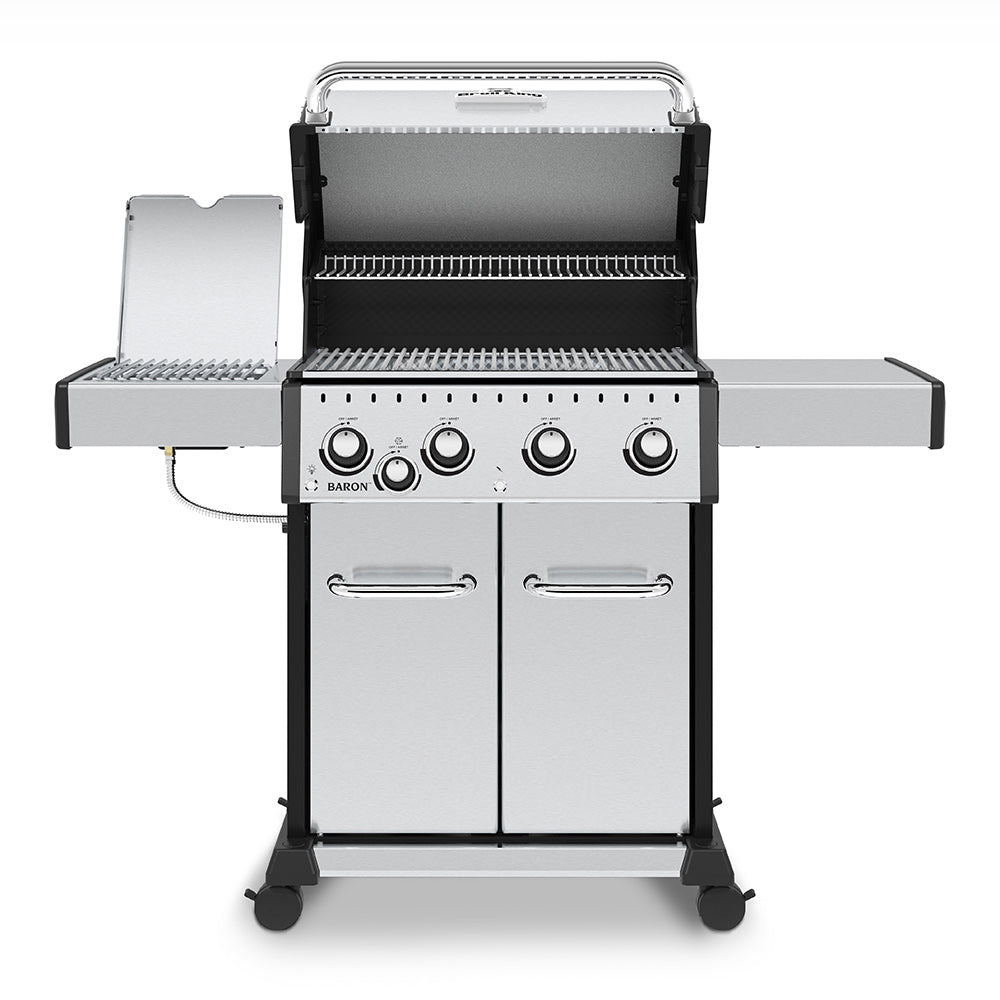 Stainless gas grill with lid open, burner grates and side burner