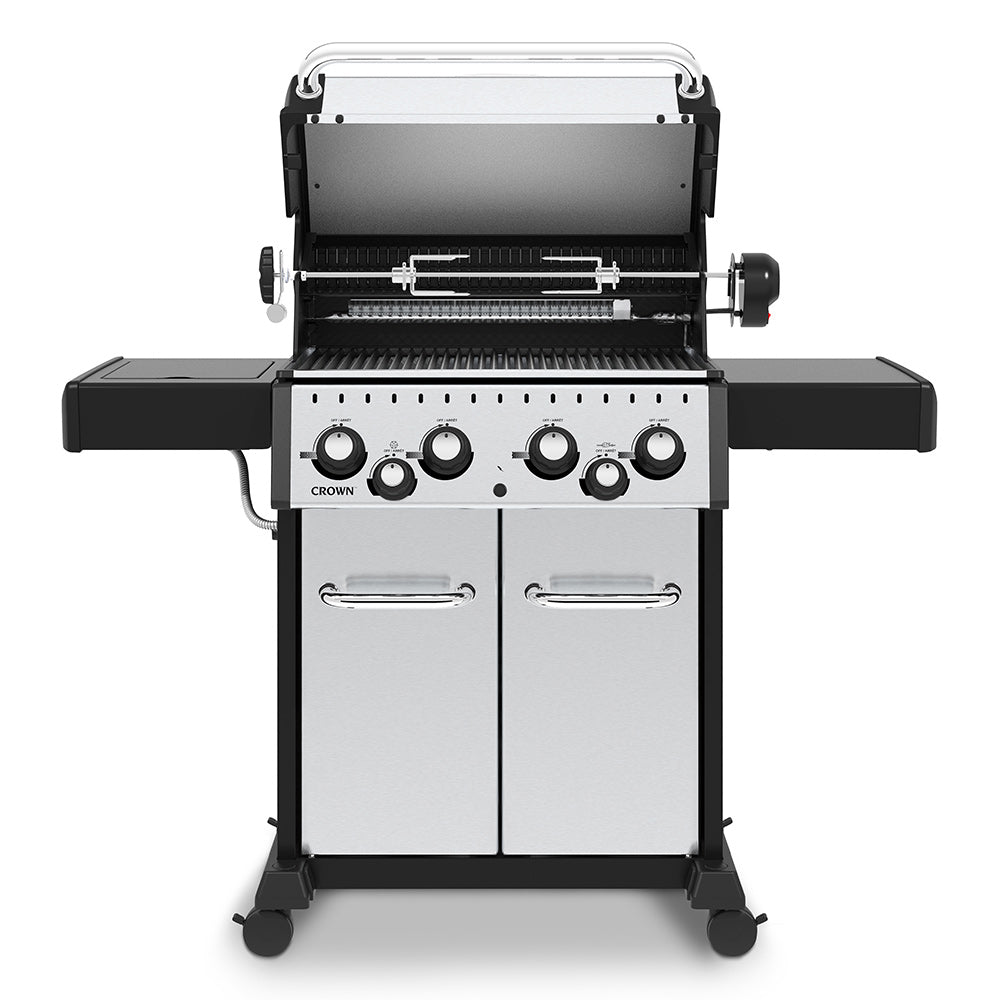 Stainless steel 4-burner gas grill with open hood and burner grates