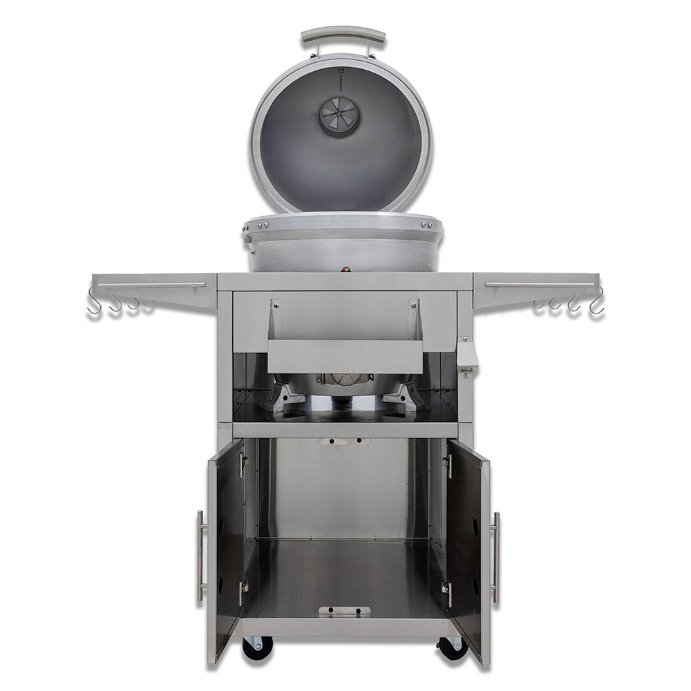 Kamado grill on cart with open lid, dark firebox, and side shelves