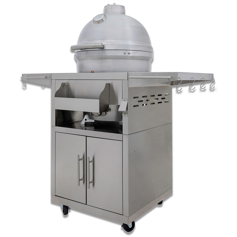 Kamado grill on cart with open firebox and cabinet doors, side shelves
