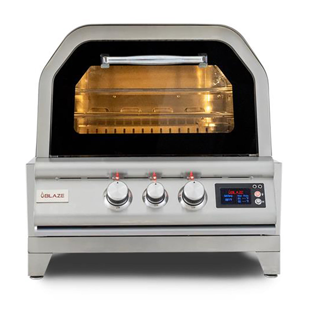 Tabletop stainless steel gas pizza oven with open door and three control knobs