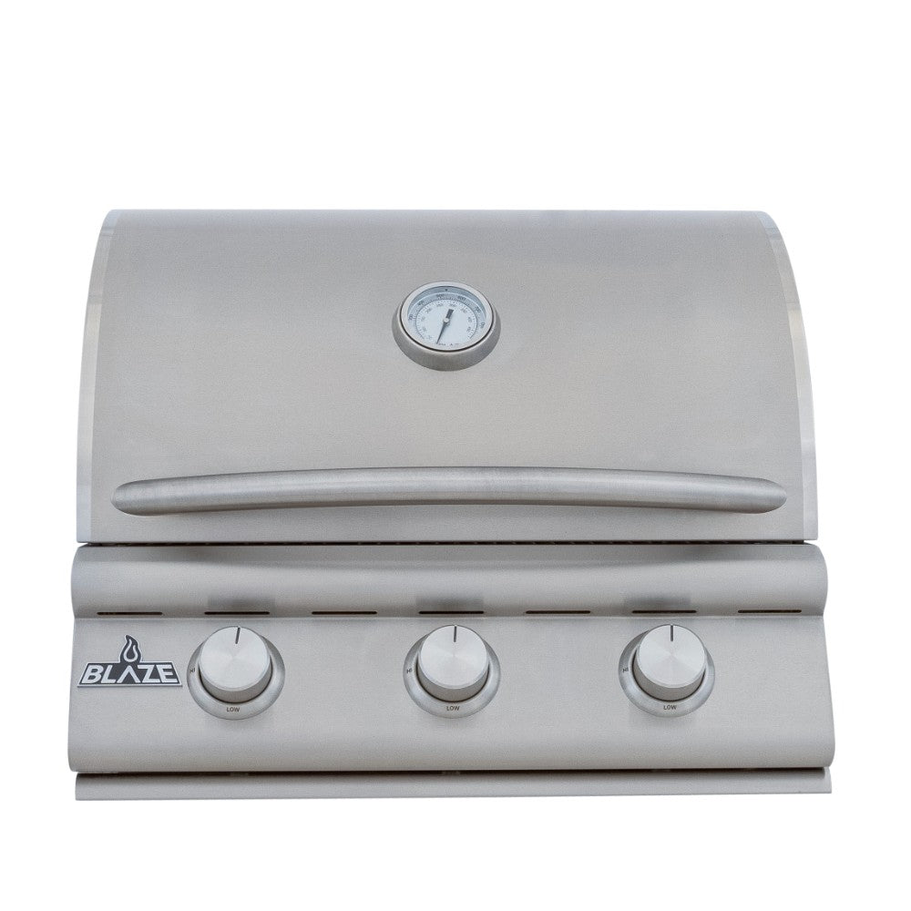 Built-in 3-burner gas grill with closed lid, thermometer, and three control knobs