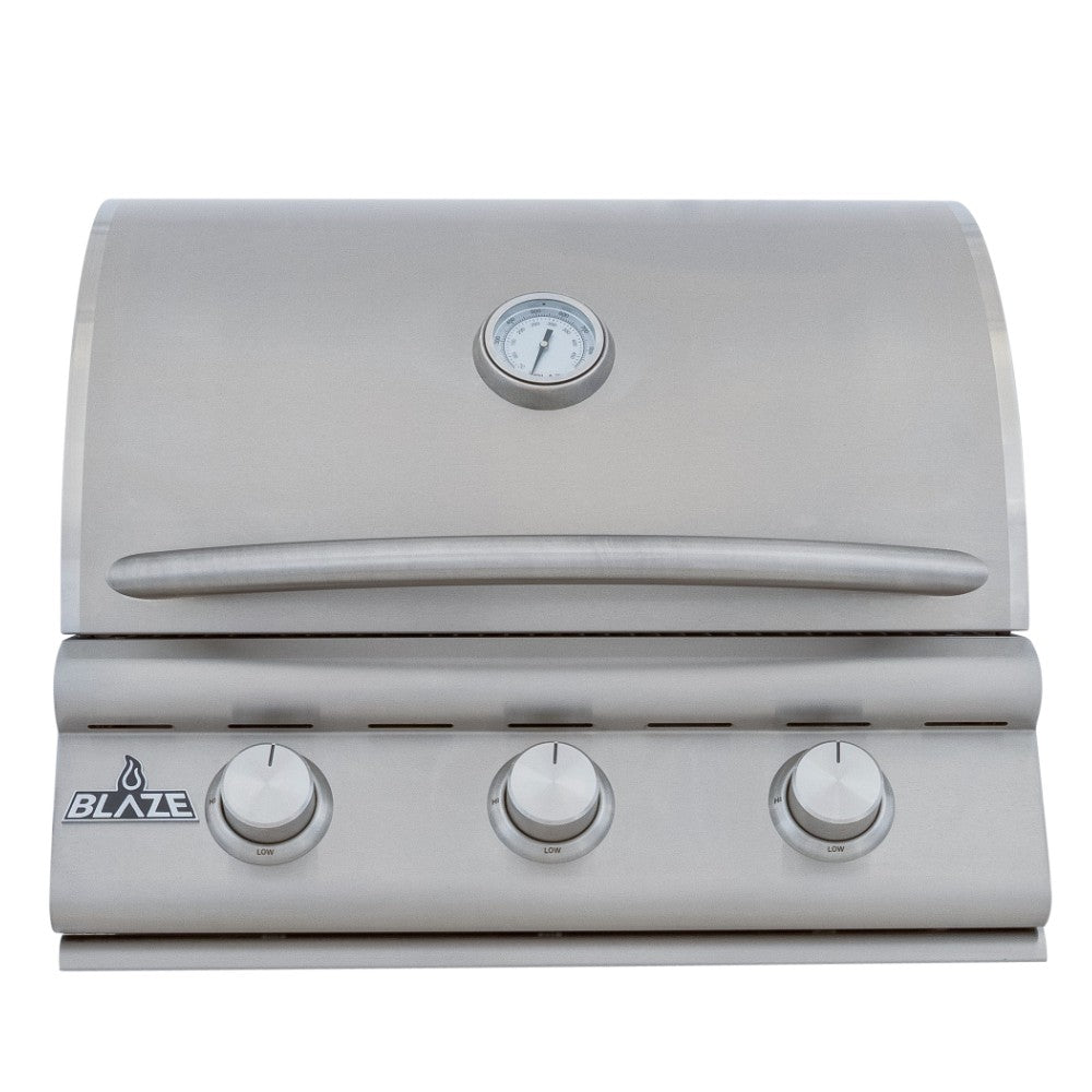 Built-in 3-burner gas grill with closed lid, thermometer, and three front knobs