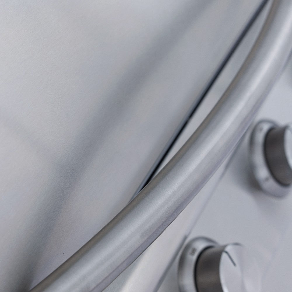 Built-in gas grill control area with rotary knob and partial BLAZE logo