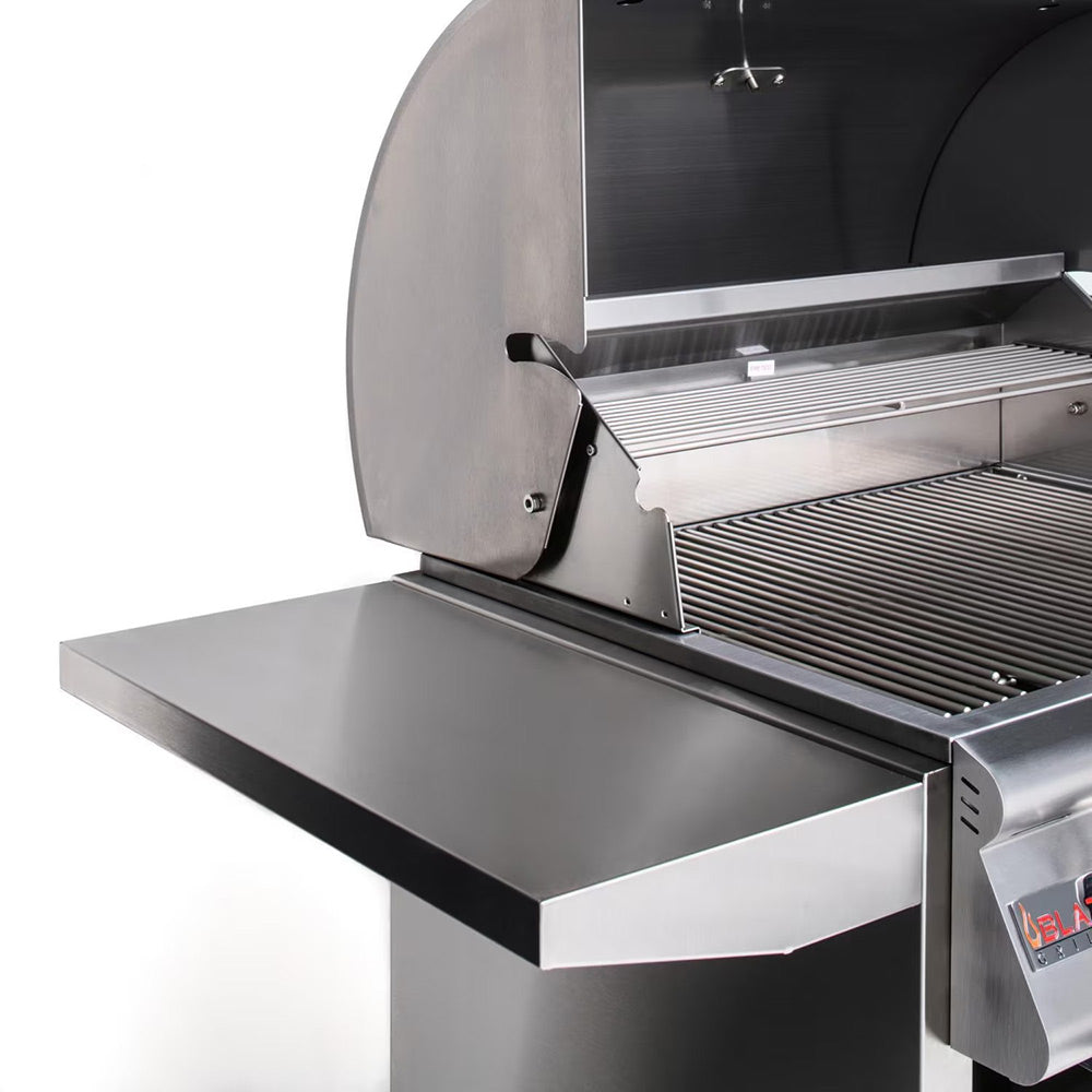 Open 3-burner gas grill hood showing stainless steel cooking grates and side ledge