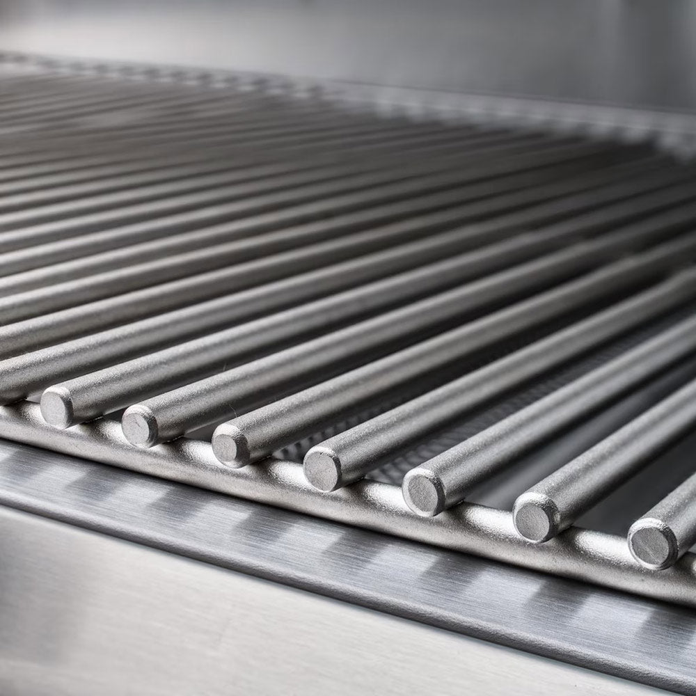 Close-up of stainless steel grill grates with parallel bars