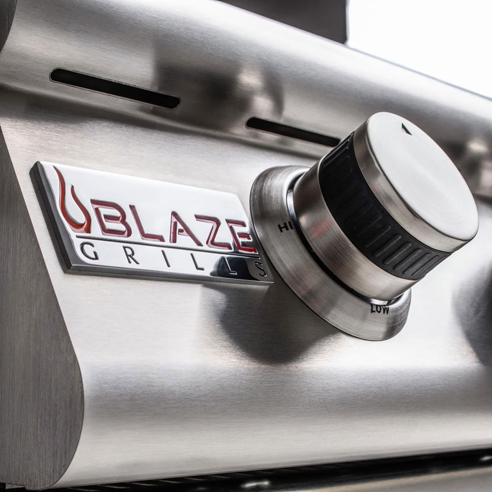 Gas grill control panel with Blaze logo and high/low burner knobs