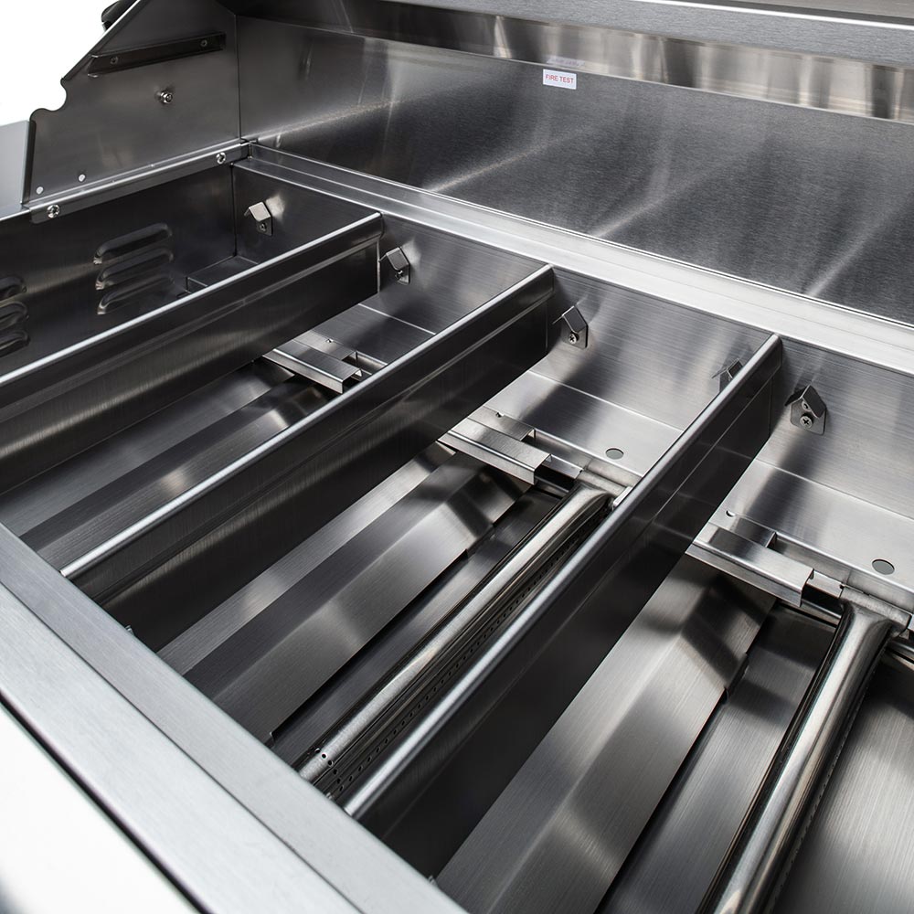 Stainless steel 4-burner gas grill interior showing grates and burner control layout