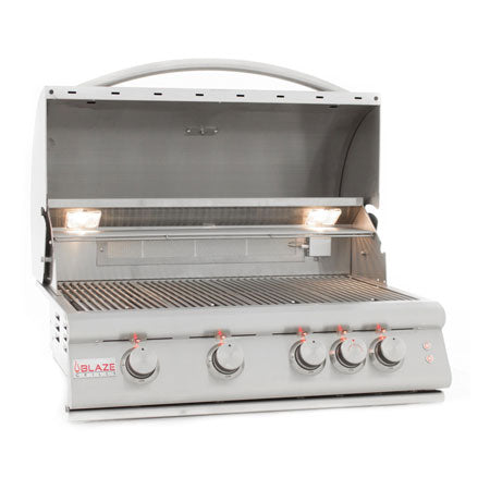 Stainless built-in gas grill with open hood, control knobs, and interior light strips