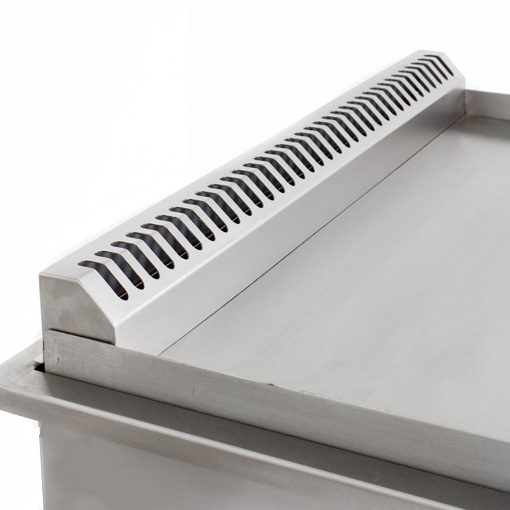 Stainless griddle cooking top with ribbed heat shield and vented front edge