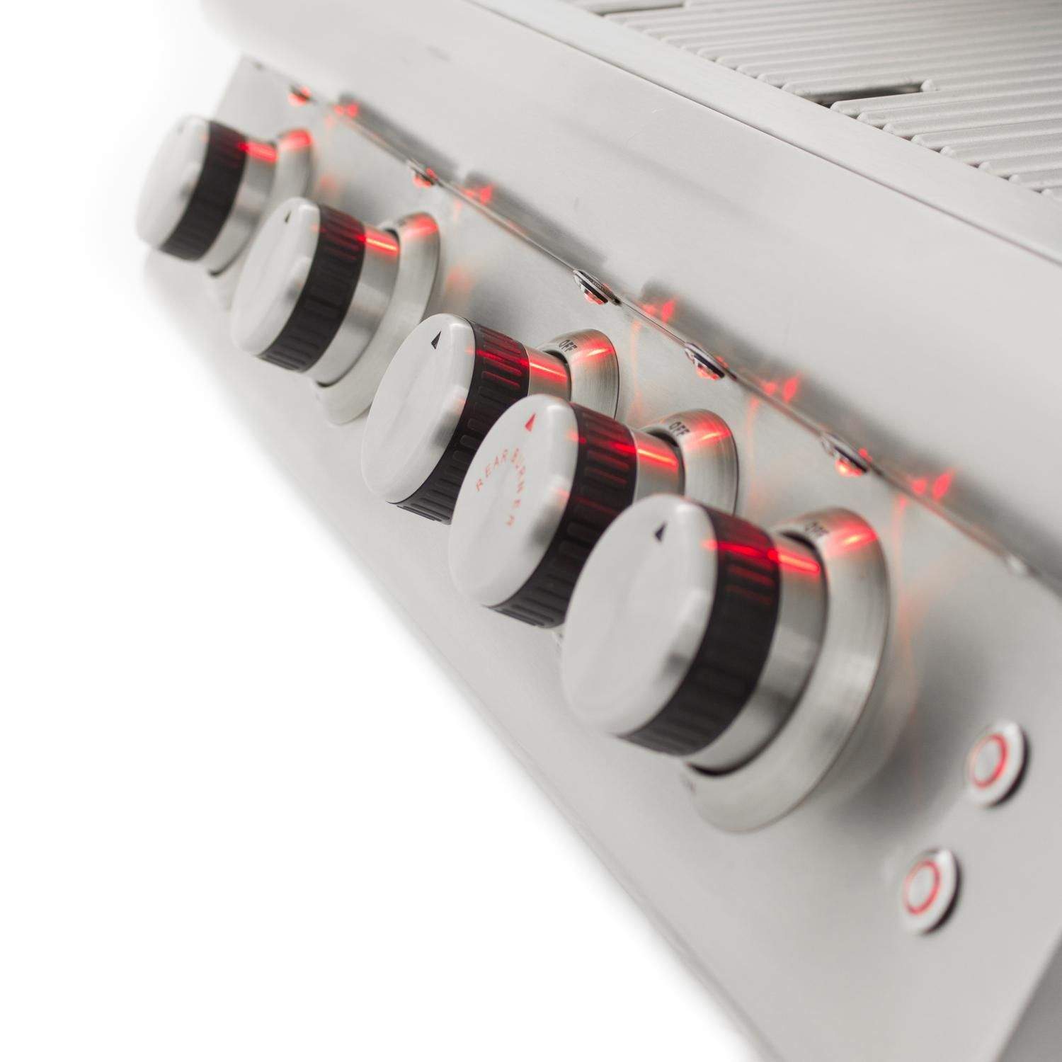 Gas grill burner knobs with red indicator lights on a stainless control bar