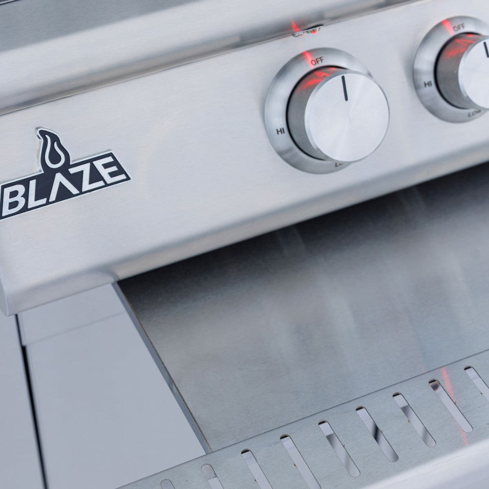 Pizza oven front panel with Blaze logo, control knobs, and vented drip tray