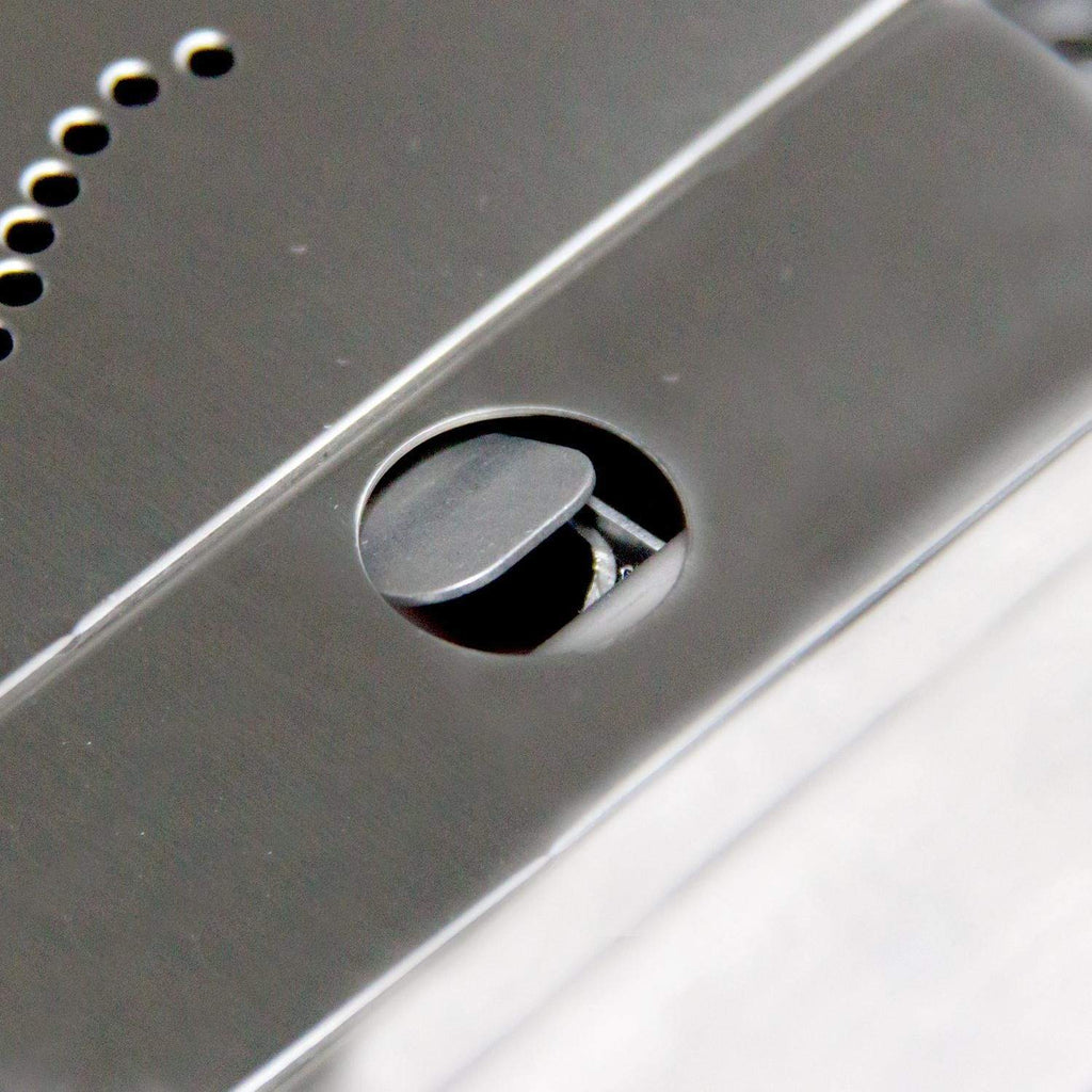 Smoker box vent opening on metal lid with rounded notch and interior view