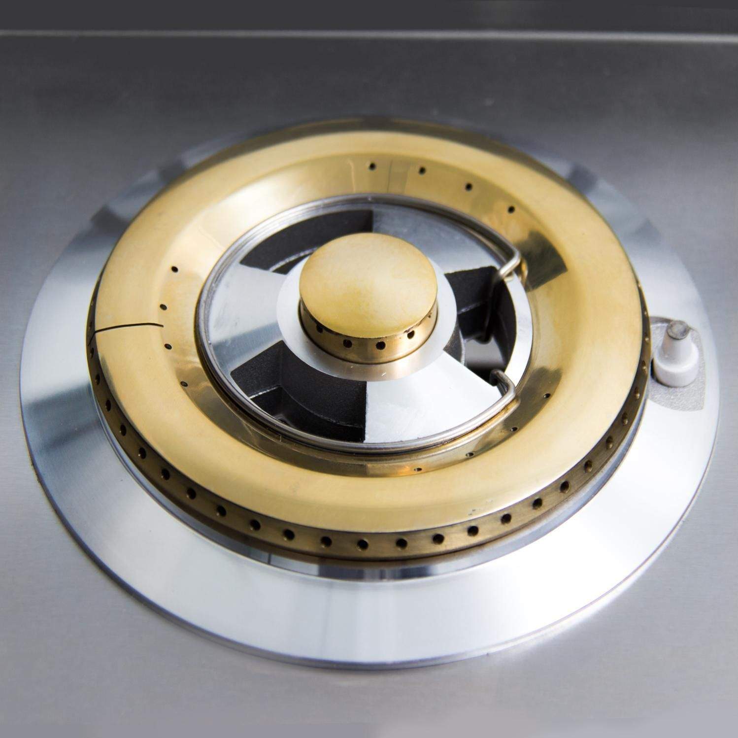 Round burner head with brass ring and flame ports on a stainless base