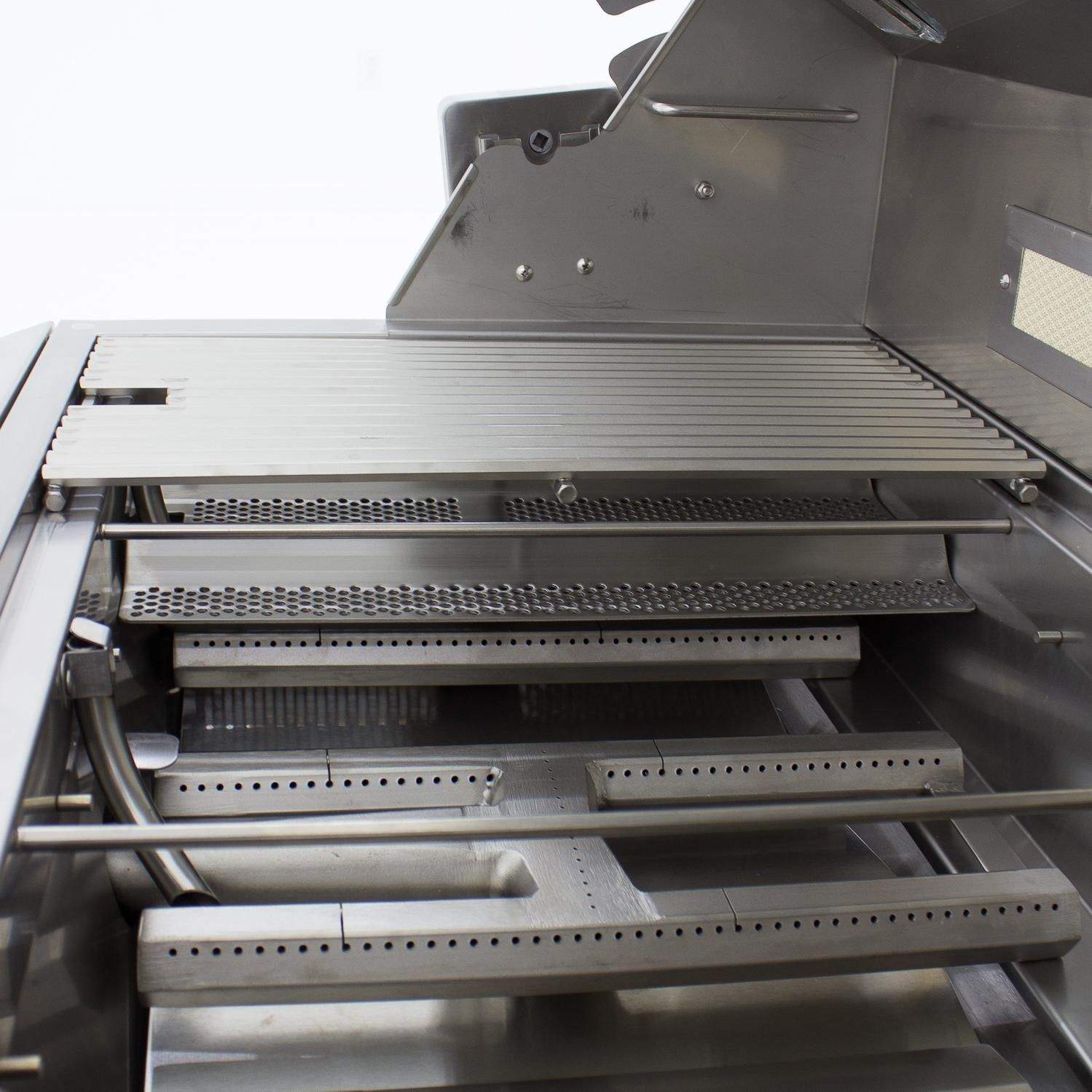Open gas grill interior with stainless cooking grates and burner components